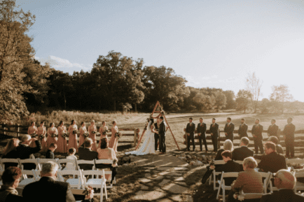 Wedding reception with guests and bride and groom at Fair Oaks Farms Backyard